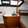 Axopar 37 Aft Cabin bedroom and sink