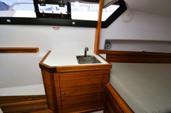 Axopar 37 Aft Cabin bedroom and sink